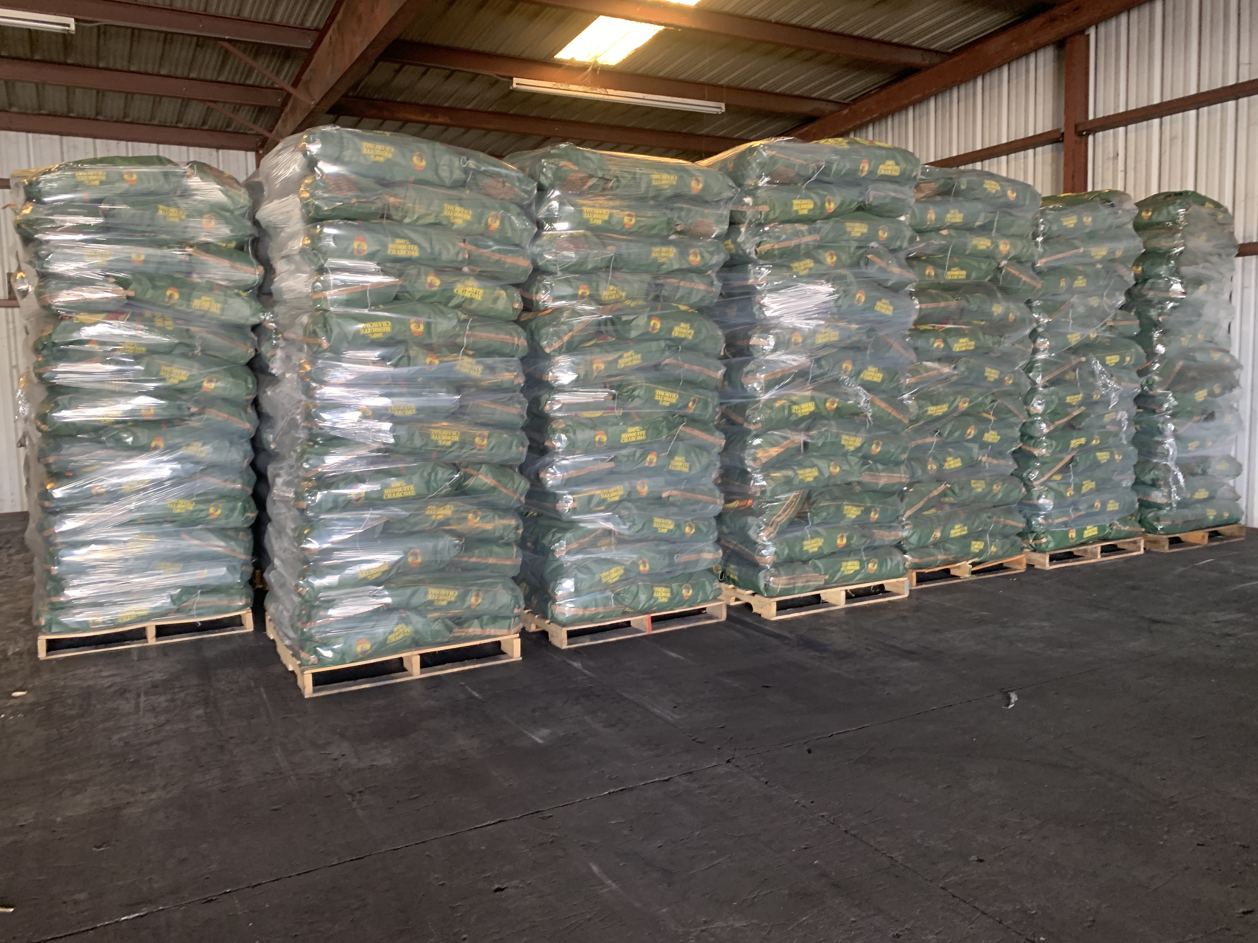 30lb mesquite charcoal pallets ready for distribution